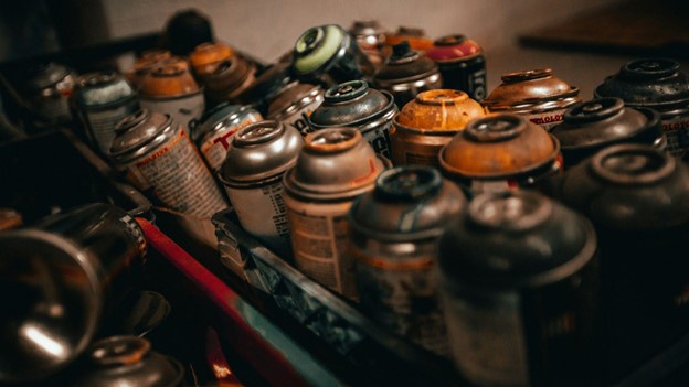 hazardous household waste such as spray paint and other aerosol cans 